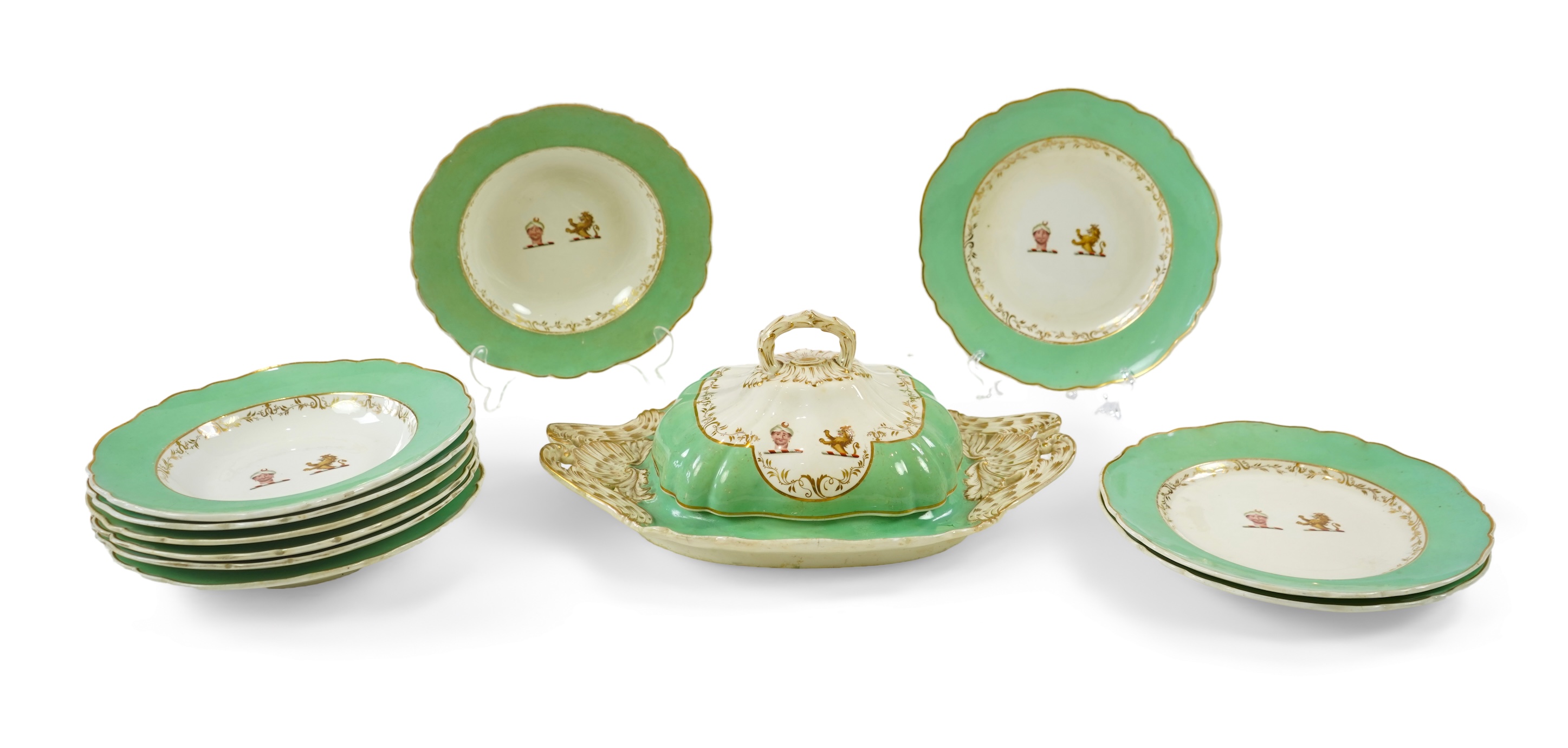 An English porcelain Turks head crested part dinner service, c.1830